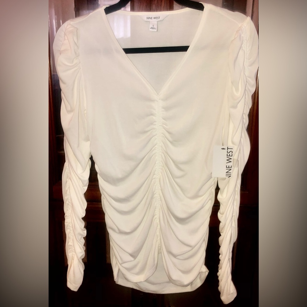 Nine West blouse with ruching on arms and front.